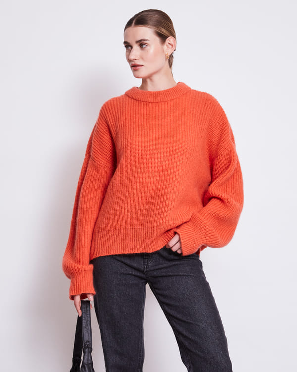 bright orange sweater